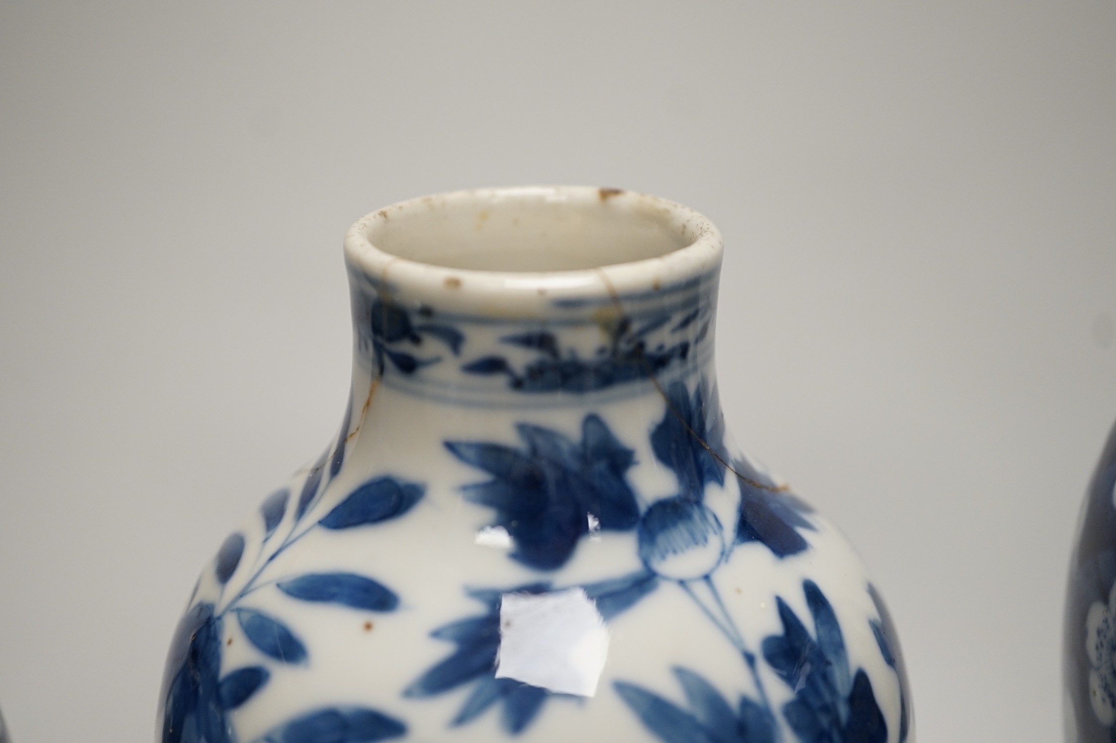 Three Chinese blue and white vases and a similar jar, 19th century, tallest 22.5 cm